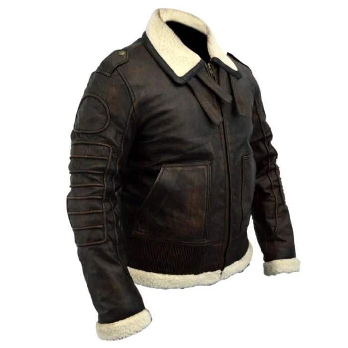 Men's brown distressed shearling leather jacket with a white shearling-lined collar and cuffs, featuring a front zipper closure and ribbed accents.
