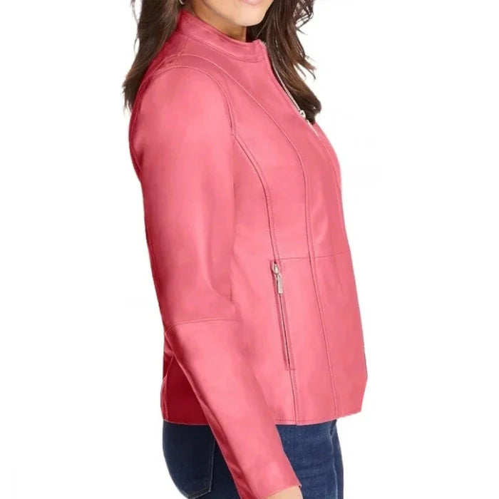 Woman wearing a vibrant pink zip front leather jacket with a round low collar, smooth and lightweight material