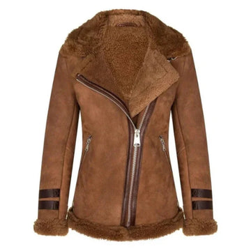 Women's tan brown shearling fur real leather jacket with a plush collar, asymmetrical zipper, and buckle straps on sleeves and waist.